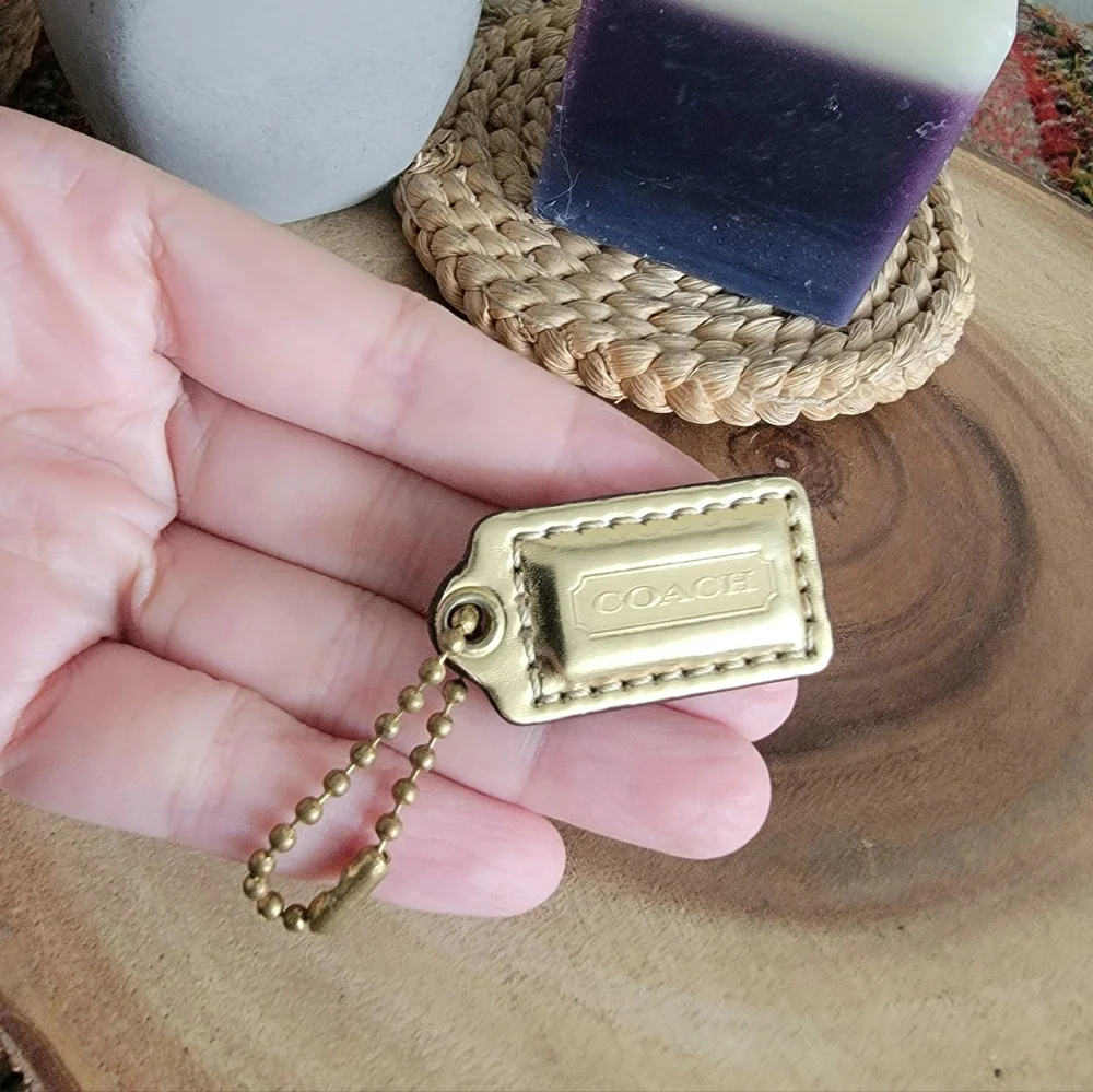 Like new Coach gold hang tag keychain bag charm pendant - Picture 1 of 4